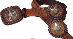 Brindle Cowhide with Leather Rosets and star conchos with Turquoise stone accentsby SSM belts.